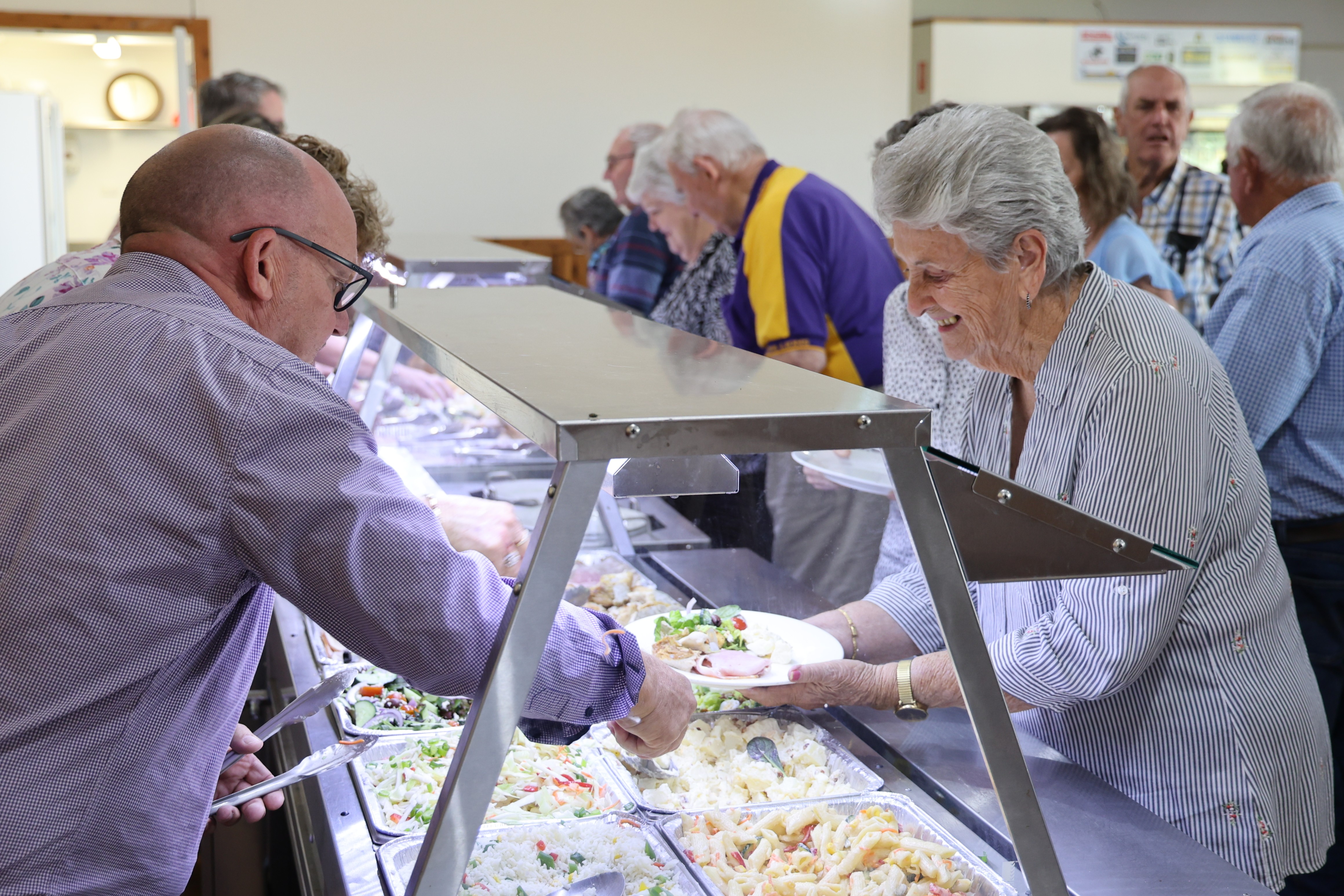 Councillors serving the seniors lunch2.JPG