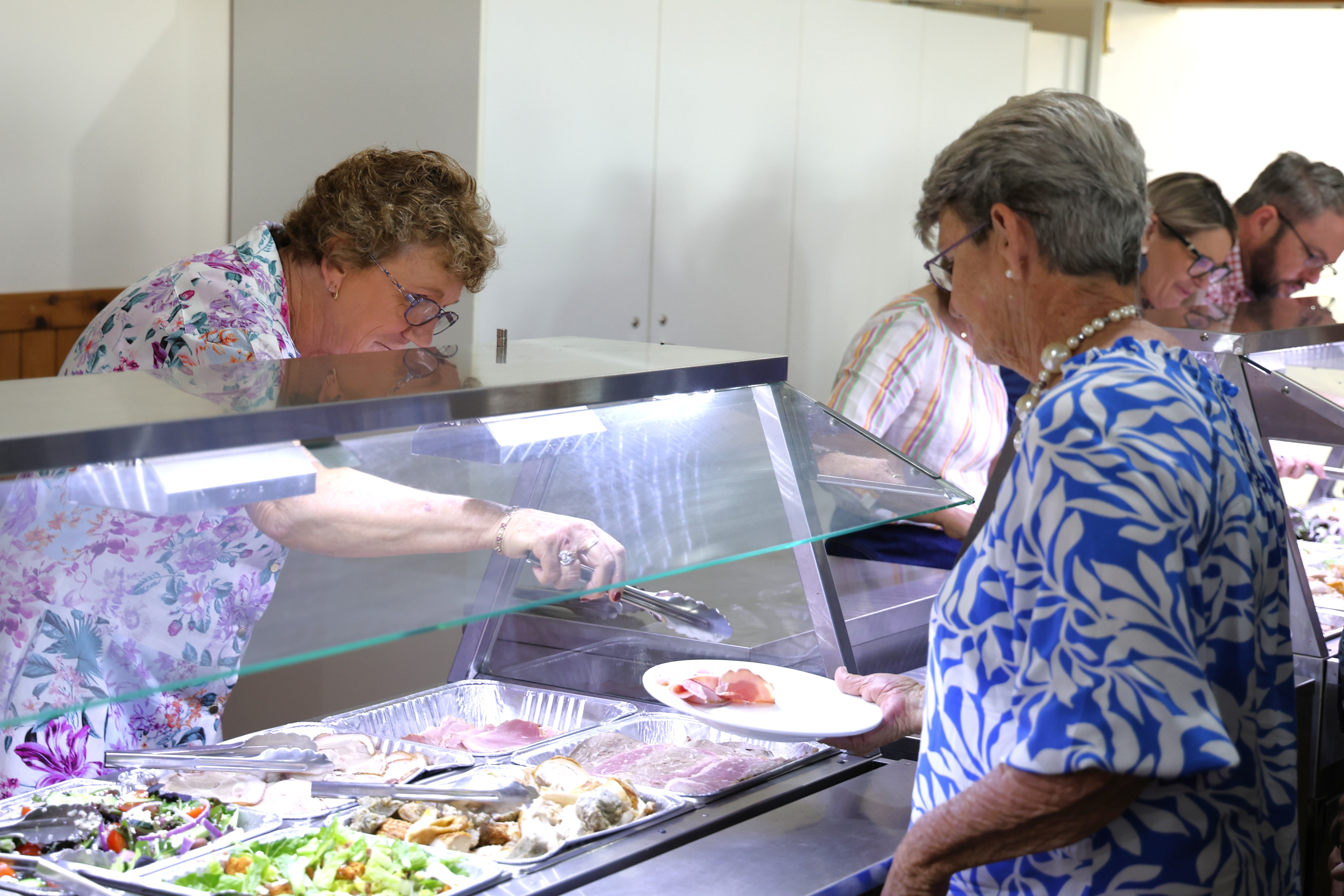 Councillors serving the seniors lunch3.JPG